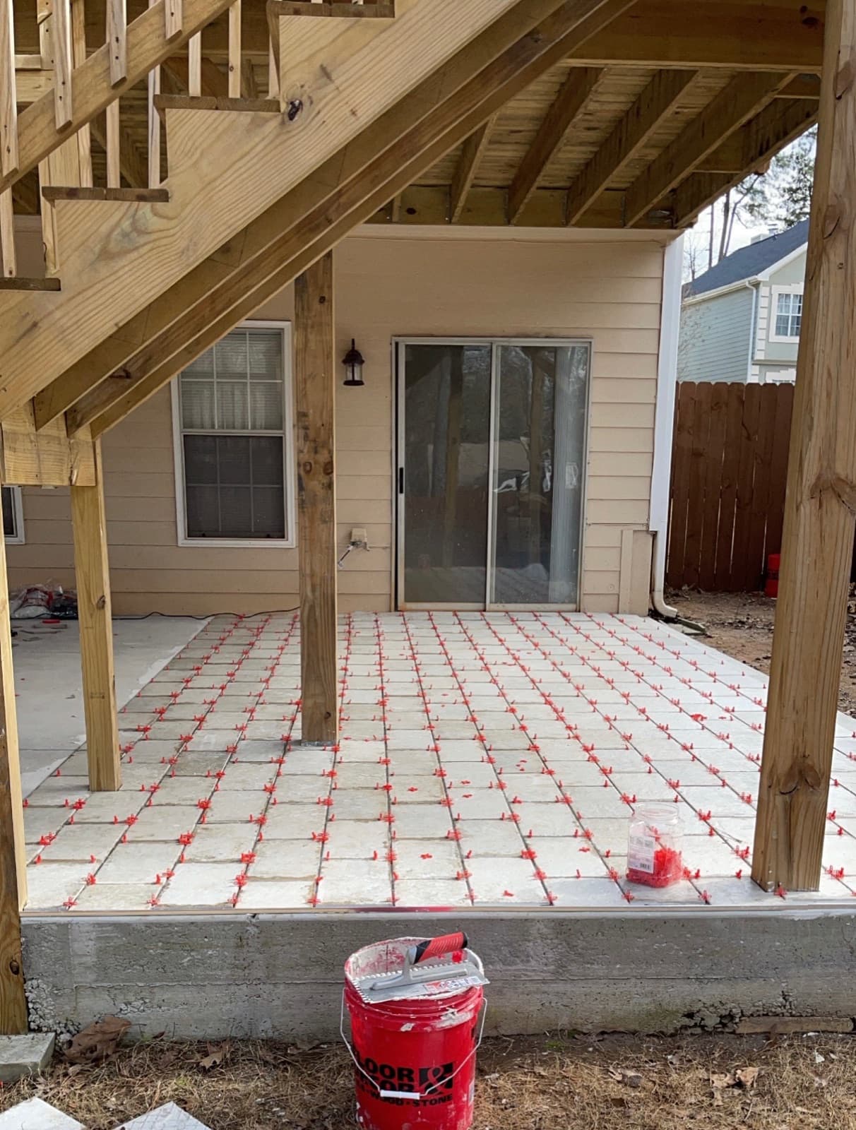 Outdoor patio tile installation in progress